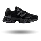 Black sneaker with a prominent brand logo on a white background