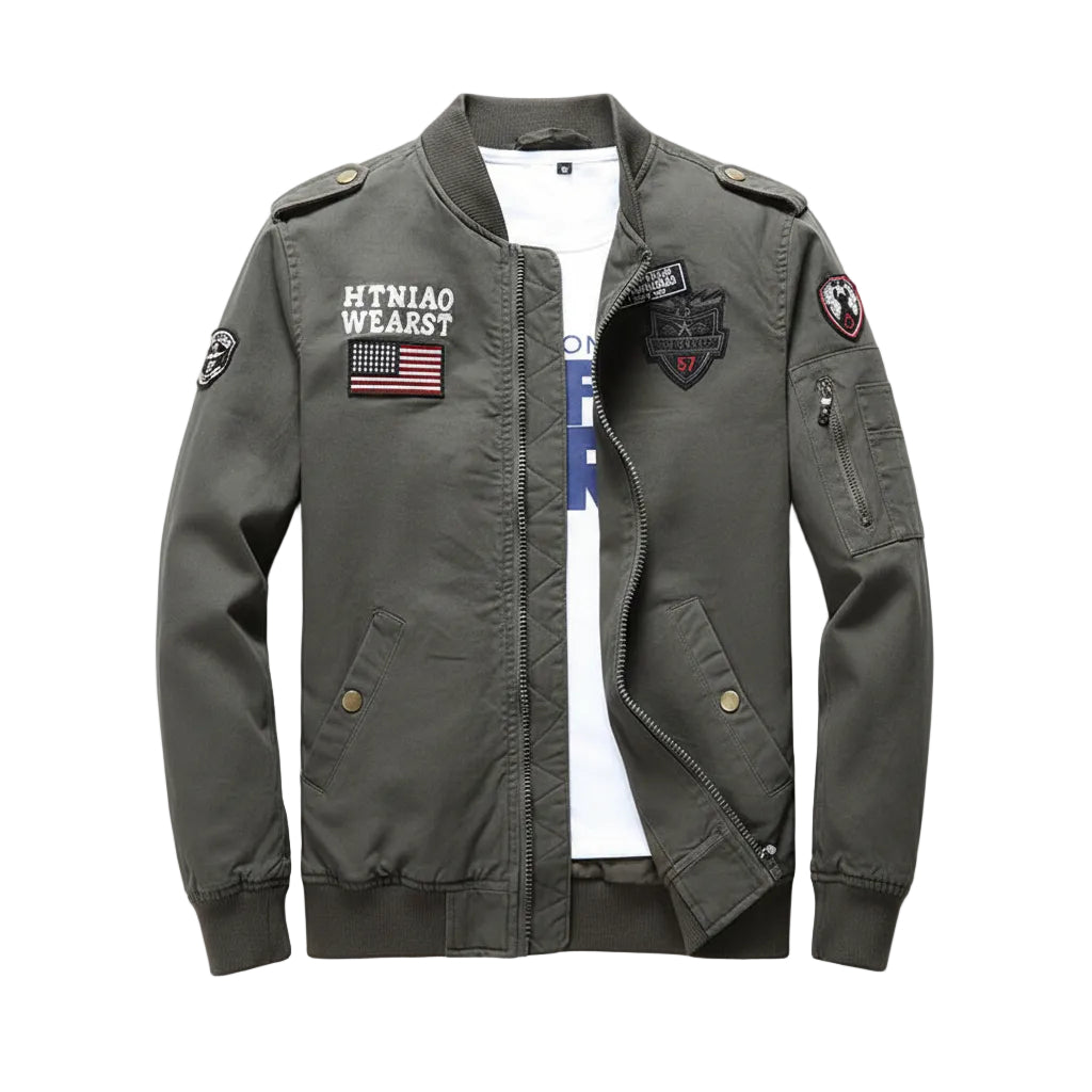 Green jacket with patches on a wooden surface