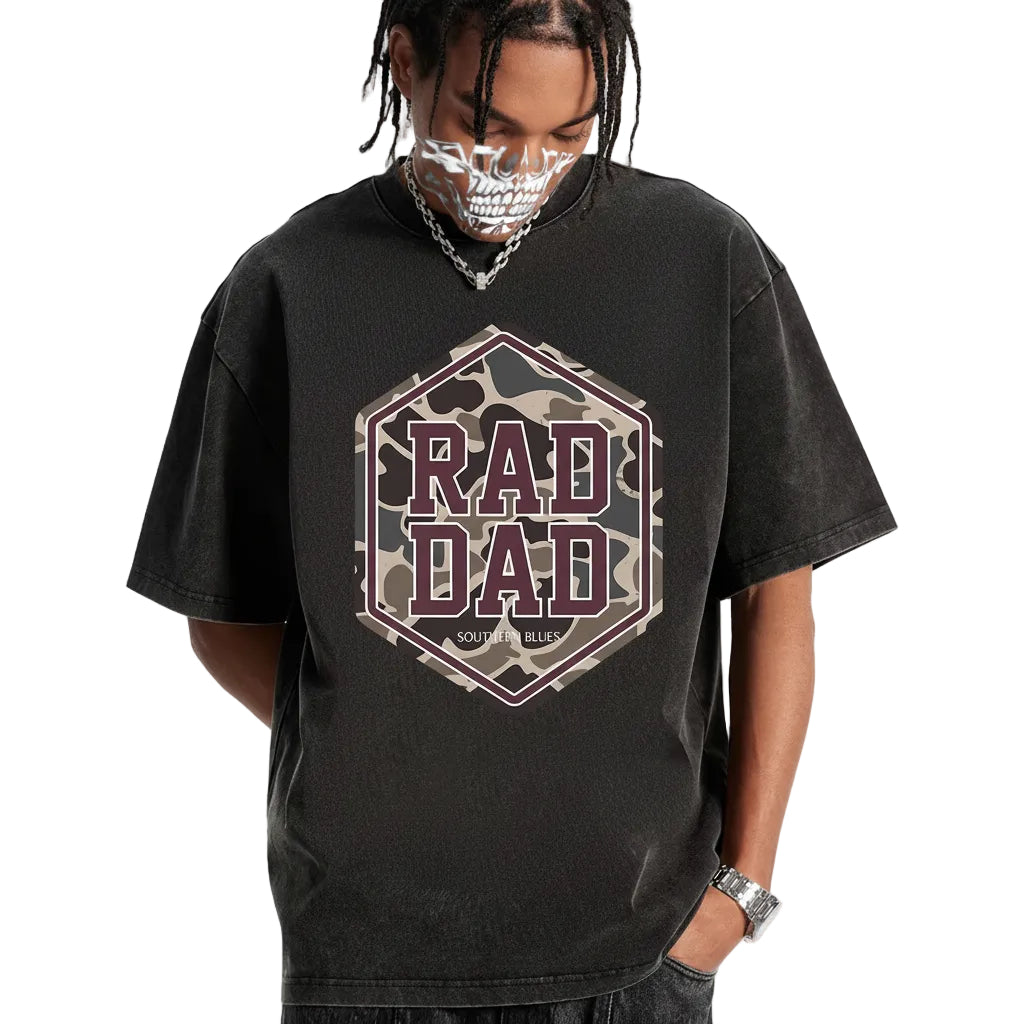 Person wearing a black t-shirt with 'RAD DAD' graphic design on a white background