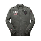 Green jacket with patches on a wooden surface