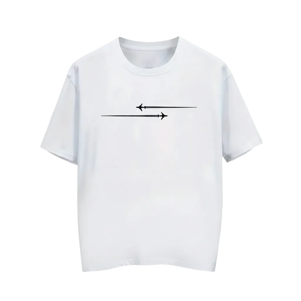 White t-shirt with black arrow design on a hanger in a clothing store.